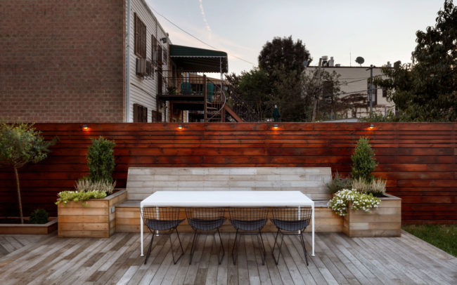A porch lounge area with outdoor furniture