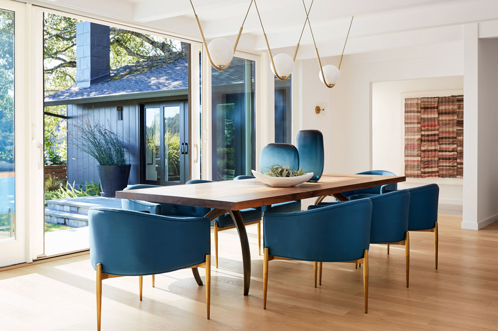 A dining room with blue colored-designs